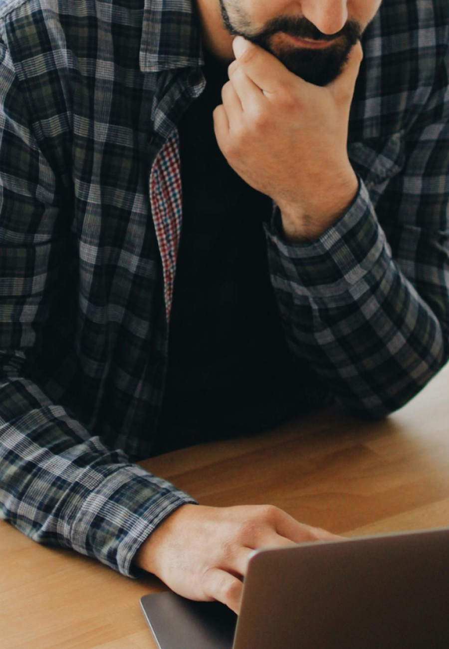 A Man Studying For His CompTIA Data+ Certification Using Dion Training Courses