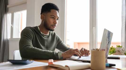Man Studying ITIL On His Laptop